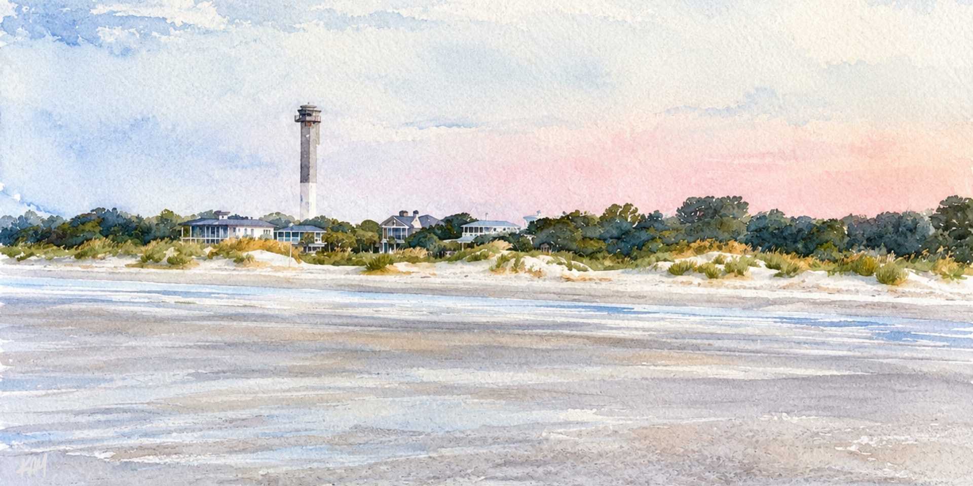 Scenic beach and sand dunes on Sullivan's Island South Carolina with the lighthouse in the distance.